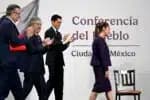 (L-R) Mexico's Economy Minister Marcelo Ebrard, Secretary of Foreign Affairs Juan Ramon de la Fuente and Chief Officer for North America Roberto Velasco Alvarez applaud President Claudia Sheinbaum during her daily press conference at Palacio Nacional in Mexico City on July 31, 2025. Mexico will seek a long-term deal with the United States to avoid tariffs, President Claudia Sheinbaum said on July 31, 2025, after US counterpart Donald Trump postponed higher duties for 90 days. (Photo by Alfredo ESTRELLA / AFP)