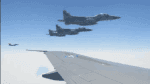 Caças da Força Aérea do Qatar acompanham aeronave presidencial americana
