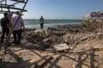 GAZA (---), 30/06/2025.- Palestinians inspect the site of an Israeli airstrike that targeted Al-Baqa Cafe, located on the seafront of Gaza City in the western part of the city, 30 June 2025. According to the Gaza Ministry of Health, the strike resulted in the death of 24 Palestinians. EFE/EPA/HAITHAM IMAD