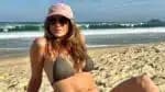 Letícia Spiller comemora 52 anos usando biquíni na praia: “Cada vez mais loba”
