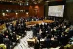 Attendees stand during a moment of silence during a ministerial high level meeting during the United Nations conference on a two state solution for Israel and the Palestinians, at UN headquarters on July 28, 2025, in New York City. Ever since the partition of Palestine into Jewish and Arab states in 1947, the United Nations has been inextricably linked to the fate of Palestinians, with the organization meeting this week hoping to revive the two-state solution. (Photo by TIMOTHY A. CLARY / AFP)