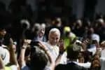 Pope Leo XIV waves to faithfuls as he leaves after leading a mass in the Tor Vergata district of Rome, as part of Jubilee of Youth, on August 3, 2025. Pope Leo XIV presided over a final mass in Rome for over one million young people, the culmination of a youth pilgrimage that has drawn Catholics from across the world. (Photo by Filippo MONTEFORTE / AFP)
